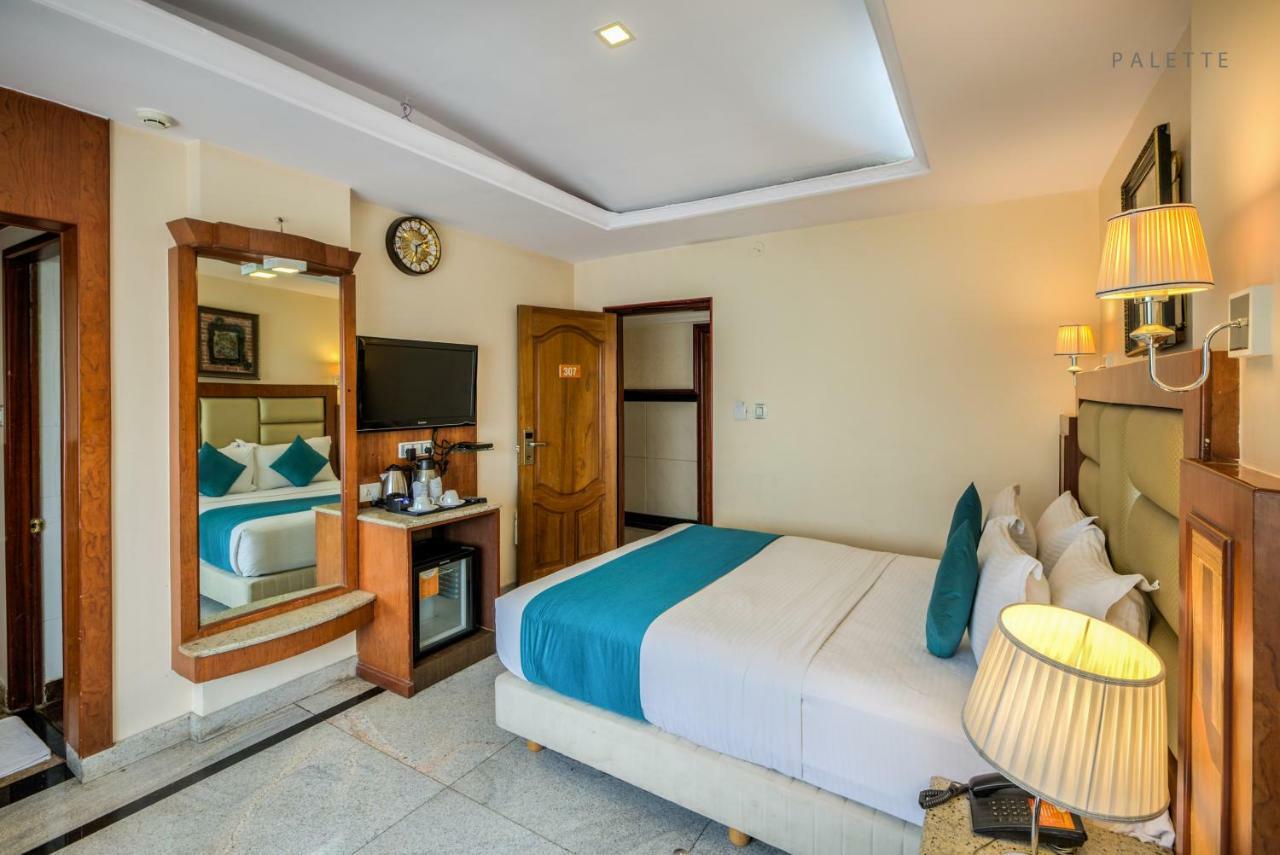 Golden Metro Hotel Бангалор Экстерьер фото